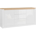 Holzoptik und glaenzende Oberflaechen bestimmen das Sideboard